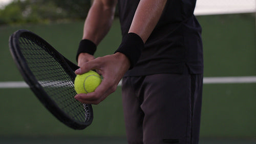 Professional tennis player serving in the game