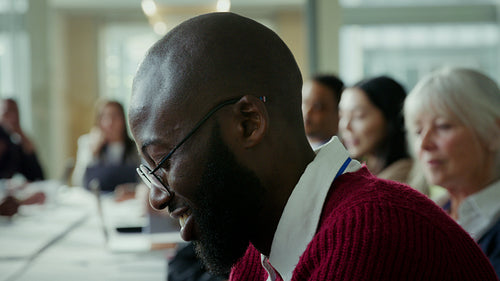 Focused professional attends a business conference
