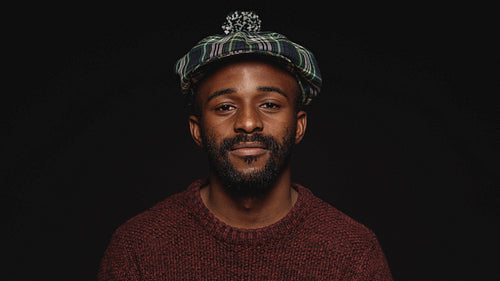 Close up of man wearing cap