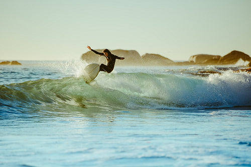Young man water surfing in the sea