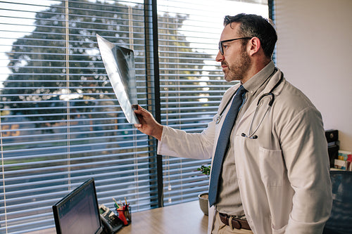 Doctor looking at a radiography