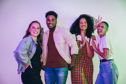 Group of friends having a good time together at a party