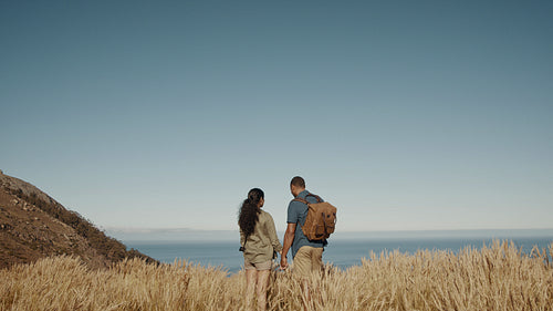 Couple out on a hike in mountains