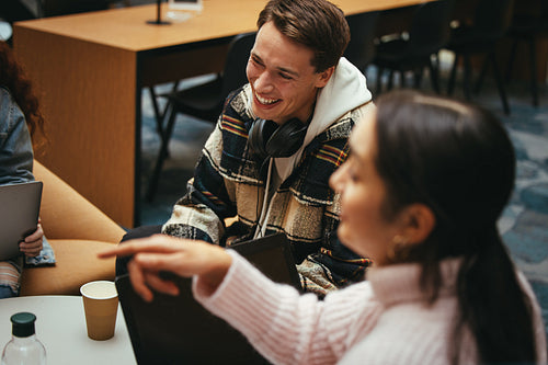 Group of students hanging out in college campus