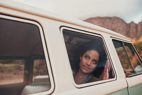 Thoughtful african woman on a road trip