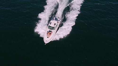 Young people relaxing on private yacht deck