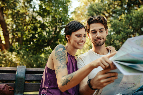 Tourist couple exploring the city