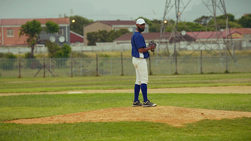 Baseball player scores a run during an intense game