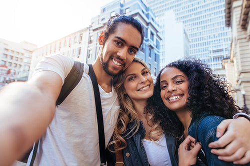 Group of friends enjoying outdoors in the city