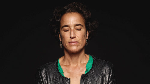 Woman with eyes closed