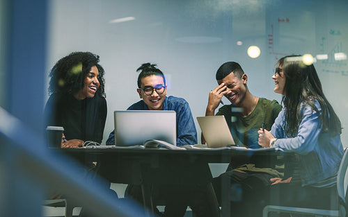 Group of happy students in university library