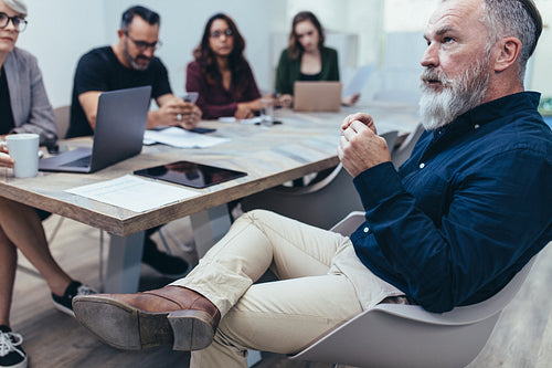 Senior businessman in a presentation