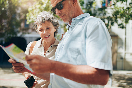 Couple of tourist reading the city map
