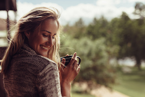 Beautiful woman having morning coffee