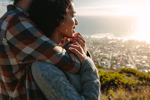 Woman in her boyfriends arms
