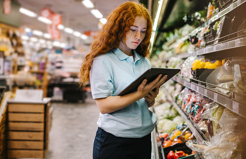 Woman working in a grocery store
