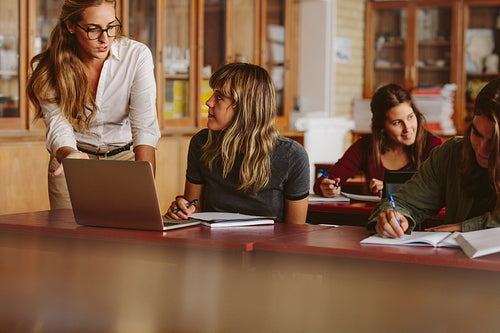 Teacher with students during her class