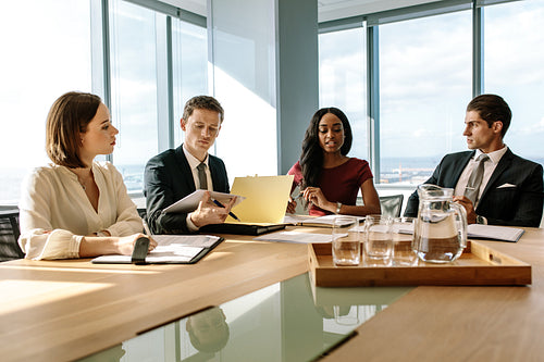 Business professionals having a brainstorming meeting