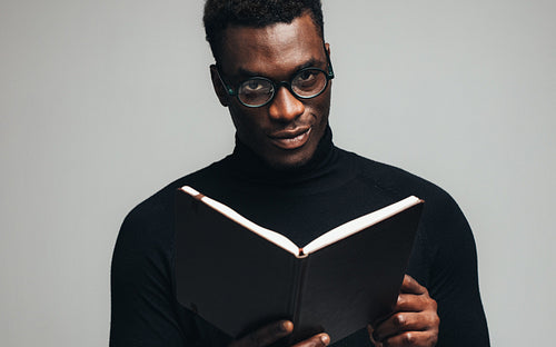 African man with a book