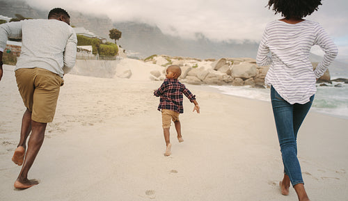 Parents having fun on the beach