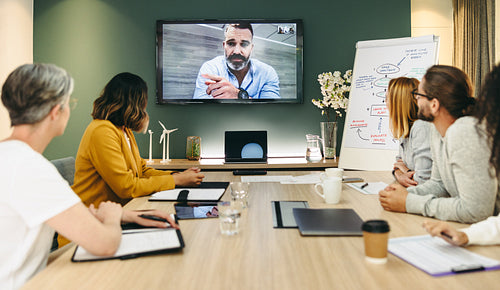 Innovative businesspeople having a video conference in a boardroom