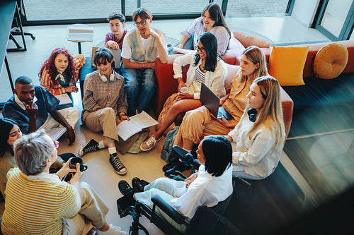Diverse Generation Z classmates in an informal study group setting, fostering collaboration and creativity in a modern educational environment.