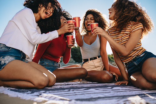 Friends chilling at the beach