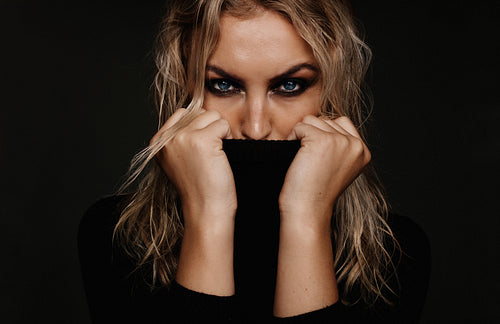 Young woman with smokey eye makeup