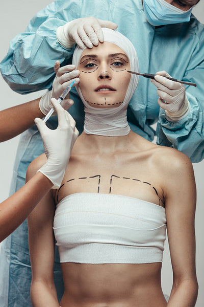 Woman undergoing a cosmetic surgery operation