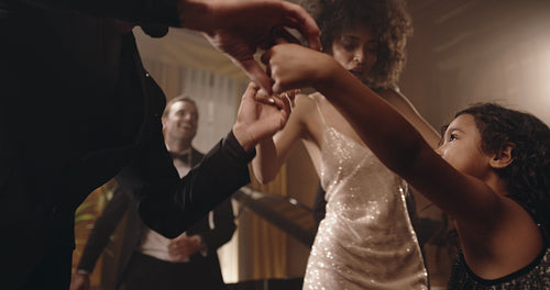 Family dancing together at party