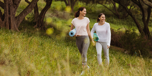 Women going in park for morning yoga