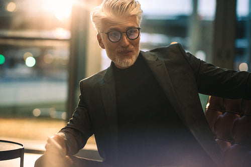 Businessman sitting on office lobby