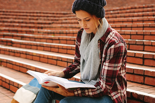 Female teenager studying in campus