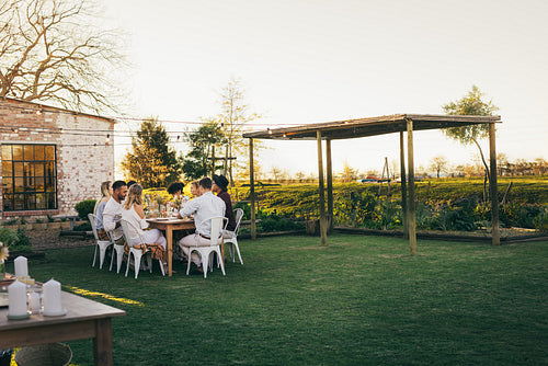 Group of friends having outdoors party