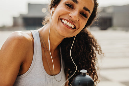 Smiling fitness woman outdoors