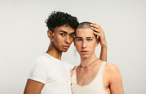 Gender fluid couple standing together