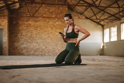 Fitness woman taking break after workout