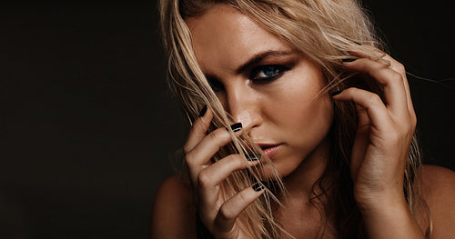 Female fashion model with smokey eyes