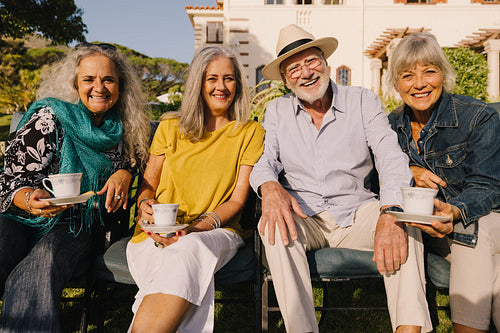 Happy senior citizens relaxing at a retirement home