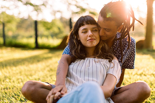 Cozy young couple in a park