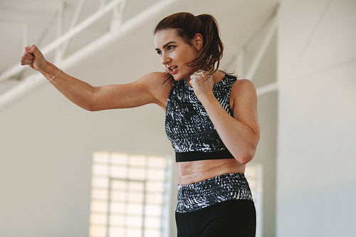 Female athlete training at the gym