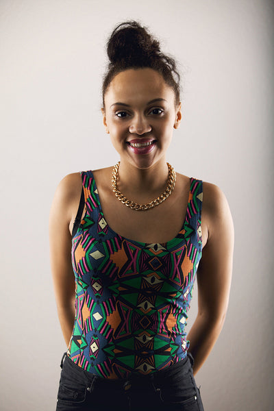 Cheerful young model in colorful tank top