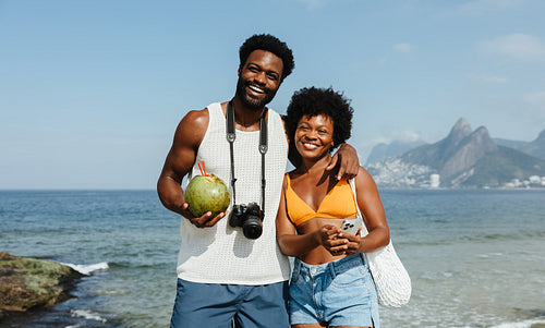 African-American tourists enjoying vacation at Ipanema Beach