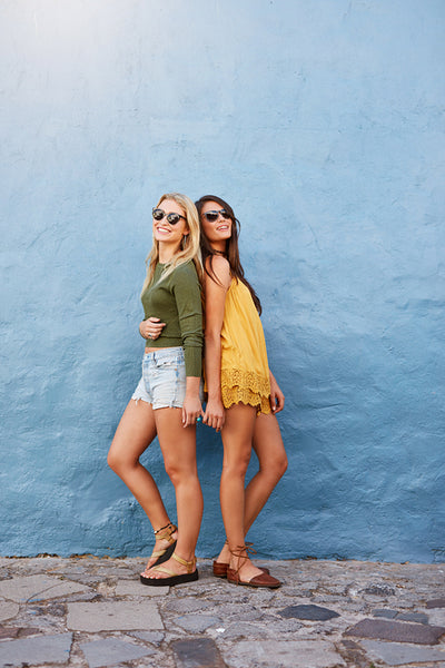 Two beautiful women in stylish casuals