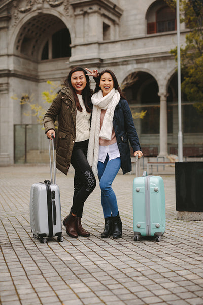 Tourists standing on street and having fun