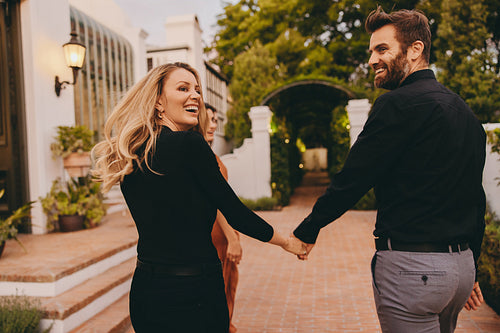 Happy couple arriving at a couples retreat