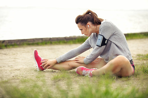 Woman Stretching Her Legs Before Workout