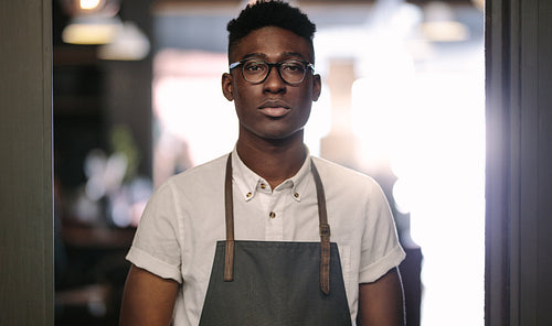 Young entrepreneur at his coffee shop