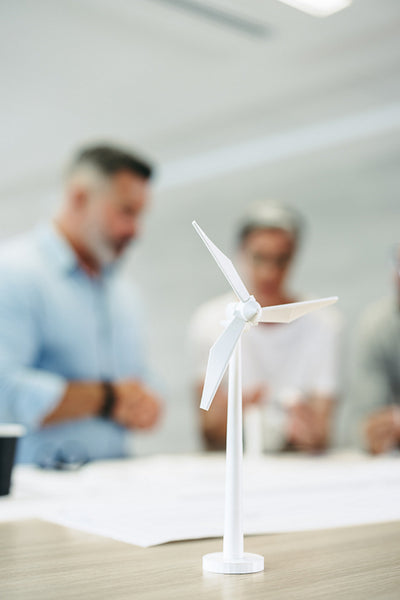 Group of engineers working on a wind turbine project