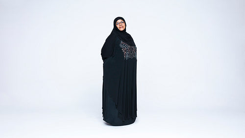 Islamic woman in hijab looking at camera
